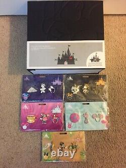 Minnie Mouse The Main Attraction Pin set January-May and Pin Collectors Book